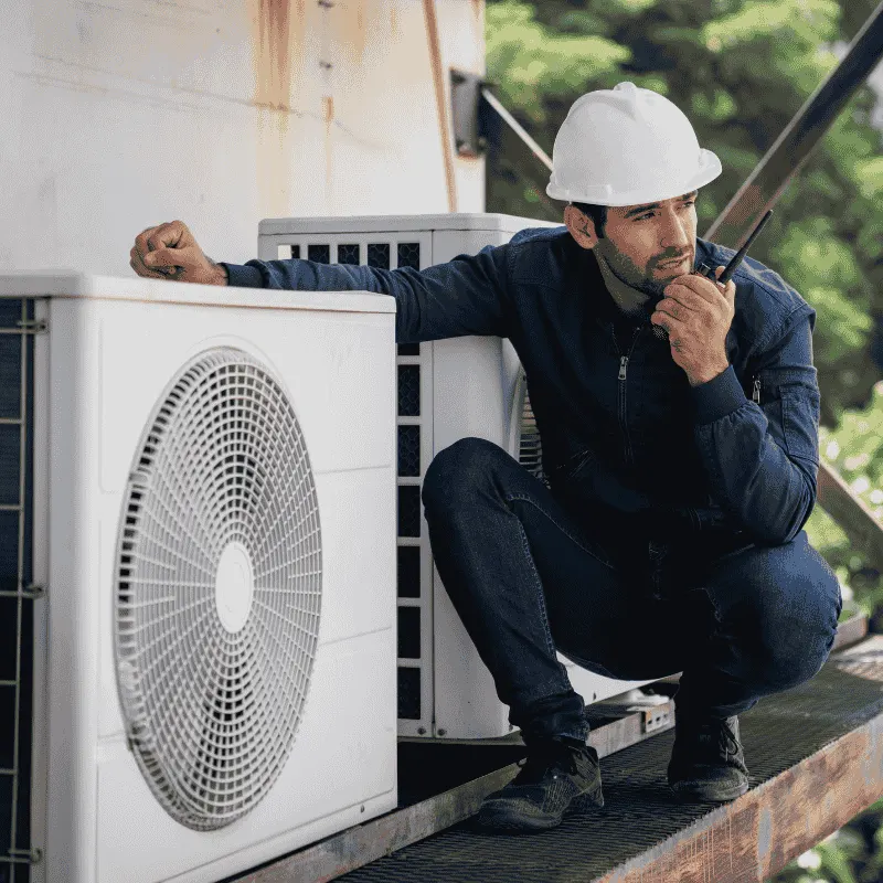 Technician performing preventive maintenance on a heat pump system in Scarborough to ensure peak performance and energy efficiency