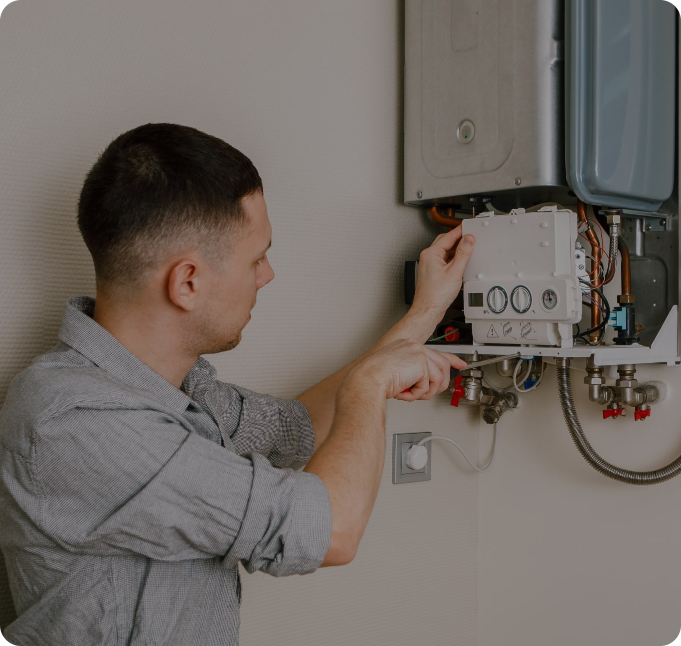 Technician performing furnace maintenance for energy efficiency in Ayr, Ontario