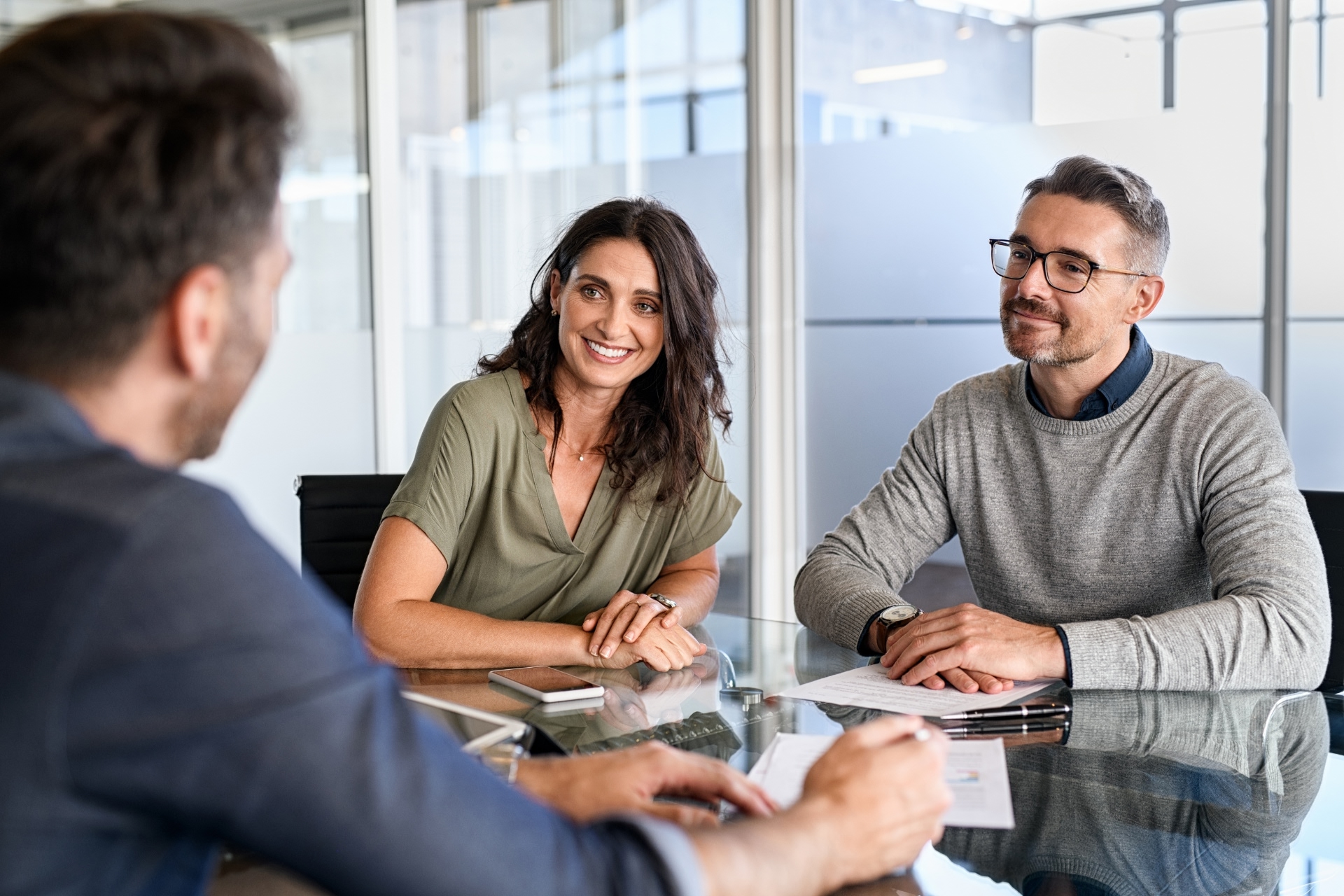 A couple meeting with a financing officer