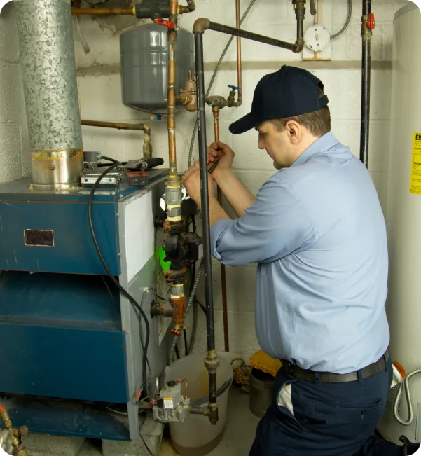 Diagnostic maintenance and mechanical pipe fitting adjustment on a residential hydronic heating boiler system