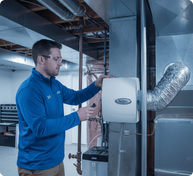 Installing a new humidifier in a residential home in Ottawa - LG Home Comfort