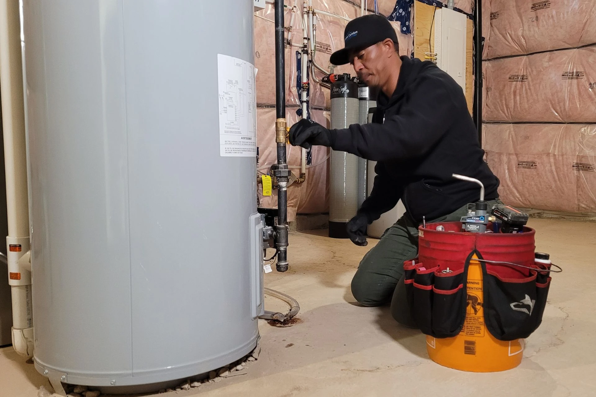 LG Home Comfort technician doing repairs on an HVAC system